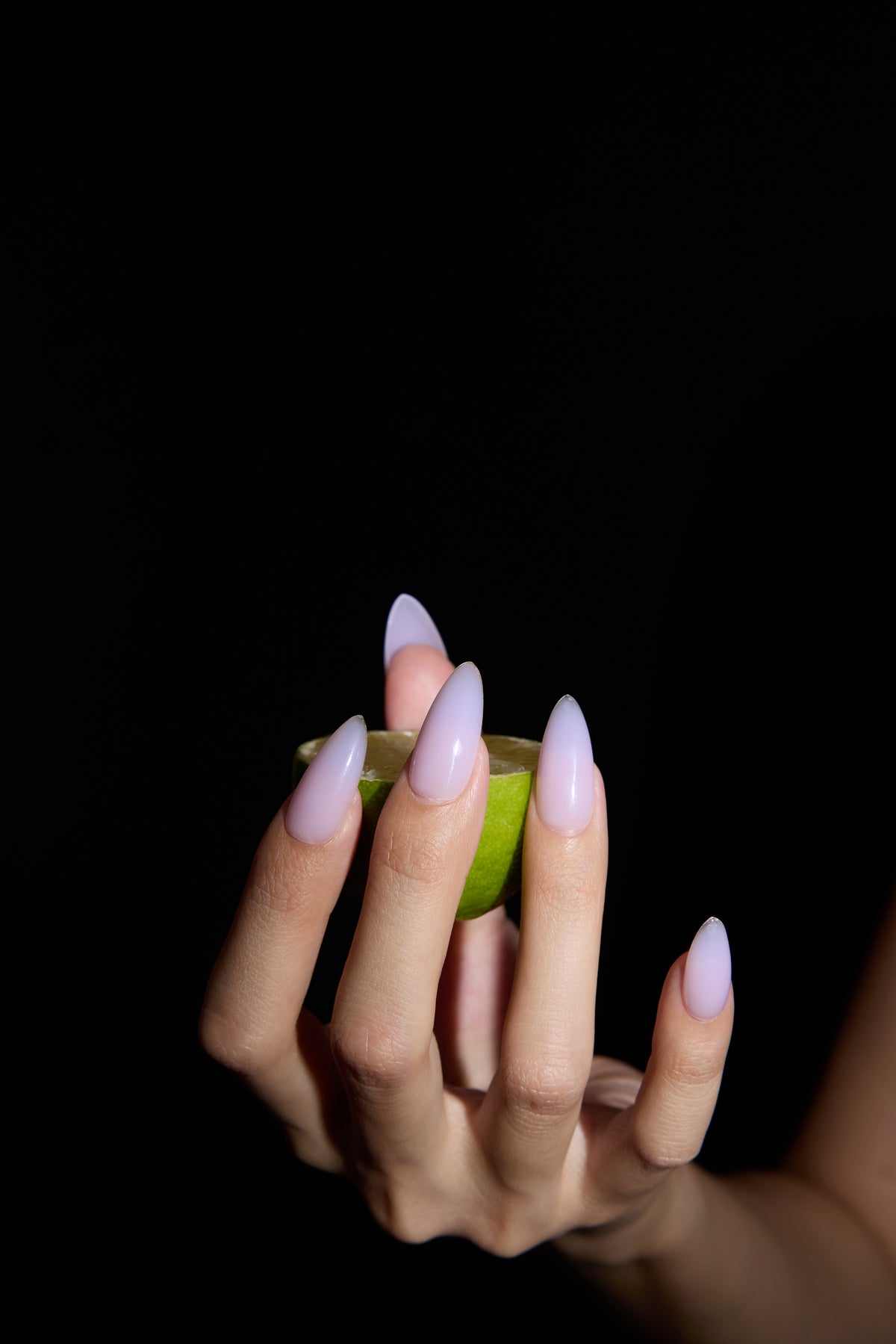 Taro Milkshake press-on nails — styled hand detail