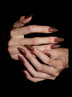 Chocolate Milkshake press-on nails — stacked hands