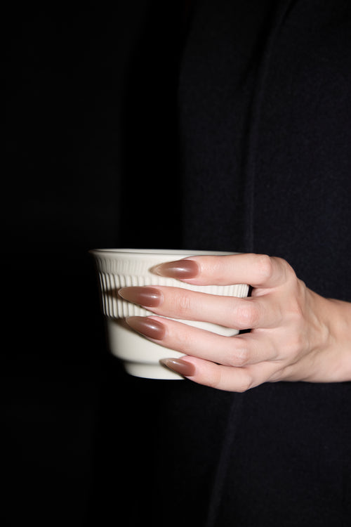 Chocolate Milkshake press-on nails — styled hand detail