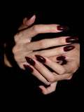 Cherry Milkshake press-on nails — stacked hands