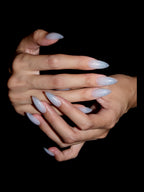 Diamond Milkshake press-on nails — stacked hands