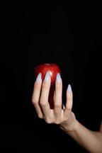 Diamond Milkshake press-on nails — styled hand detail