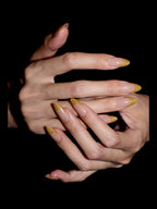 Citron French press-on nails — stacked hands