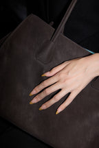 Citron French press-on nails — styled hand detail