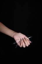 Pearl French press-on nails — styled hand detail