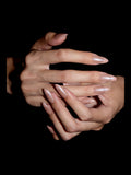 Pink Aura French press-on nails — stacked hands