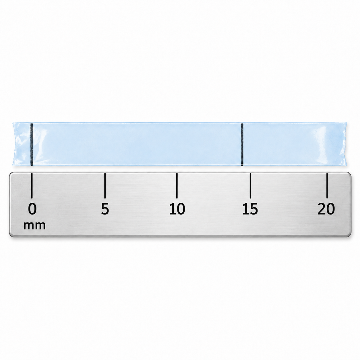 Tape lies flat against a millimeter ruler so the distance between its two marks can be measured.
